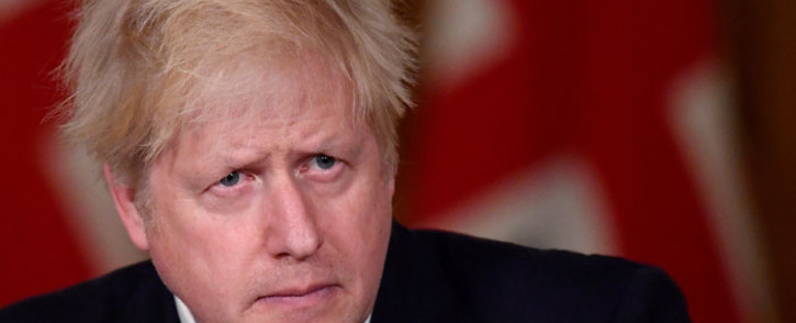 FILE: Britain's Prime Minister Boris Johnson attends a virtual press conference inside 10 Downing Street in central London on 19 December 2020. Picture: AFP