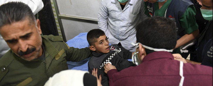 FILE: A Syrian boy receives treatment at a hospital in the regime-controlled Aleppo on 24 November 2018. Official Syrian media accused the armed opposition of launching an attack with 'toxic gas' on the northern city, but a leading rebel alliance has denied any involvement. Picture: AFP