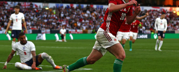 Hungary's midfielder Roland Salai (C) celebrates after scoring their second goal during the UEFA Nations League, league A group 3 football match between England and Hungary at Molineux Stadium in Wolverhampton, central England on 14 June 2022. Picture: Adrian DENNIS / AFP
