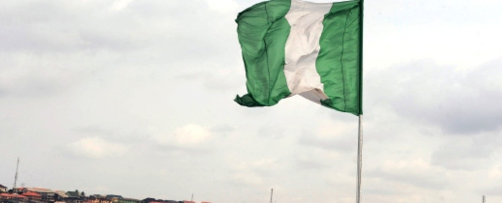 FILE: The Nigerian flag flies in Lagos. Picture: AFP.