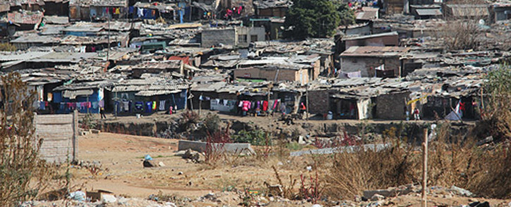 Shacks on the banks of the Jukskei River in Alexandra township - the likely alternative for women living in hostels. Picture: Taurai Maduna/EWN.