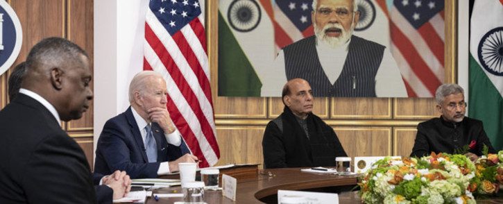 (L-R) US Defence Secretary Lloyd Austin, US President Joe Biden, Indian Minister of Defense Rajnath Singh, and Indian Foreign Minister Subrahmanyam Jaishankar listen as Prime Minister of India Narendra Modi (on screen) speaks during a virtual meeting in the South Court Auditorium of the White House complex 11 April 2022 in Washington, DC. Picture: Drew Angerer/Getty Images/AFP