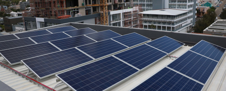 Premier Helen Zille officially switched on the newly-installed Solar Photovoltaic system in the Cape Town CBD on 19 October. The solar panels were set up at the Provincial Transport and Public Works Department offices. Image: Bertram Malgas/EWN.
