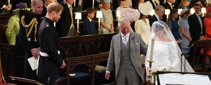 The Prince of Wales accompanied Ms Meghan Markle down the aisle of the Quire of St George’s Chapel. Picture: @ClarenceHouse/Twitter