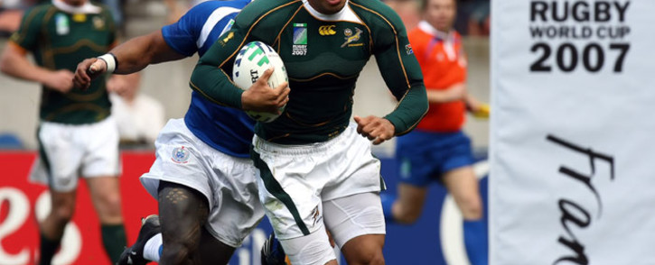 FILE: Springbok winger Bryan Habana runs in to score a try at the 2007 Rugby World Cup. Picture: AFP
