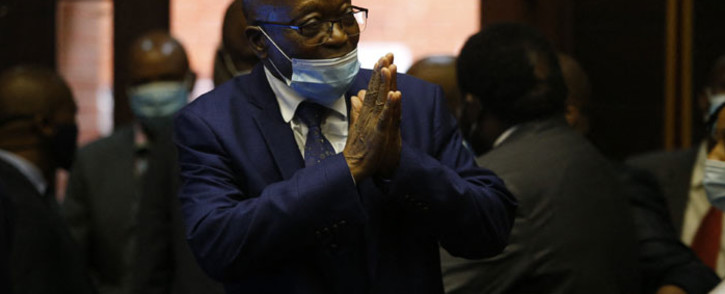 FILE: Former South African president Jacob Zuma who is facing fraud and corruption charges greets supporters in the gallery of the High Court in Pietermaritzburg, South Africa, on 17 May 2021. Picture: Rogan Ward/AFP