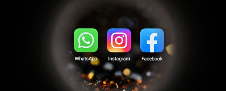 This picture taken in Moscow on 5 October 2021 shows the US instant messaging software Whatsapp's logo, the US social network Instagram's logo, and the US online social media and social networking service Facebook's logo on a smartphone screen. Picture: Kirill KUDRYAVTSEV/AFP