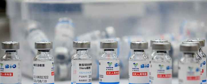 FILE: Empty vials of the Sinopharm COVID-19 coronavirus vaccine are kept on a table at a vaccination centre in Hanoi on 10 September 2021. Picture: Nhac NGUYEN/AFP