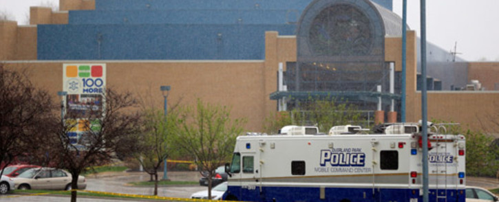 A police vehicle sits in front of the Jewish Community Center after three were killed when a gunman opened fire on 13 April, 2014 in Overland Park, Kansas. Picture: AFP.