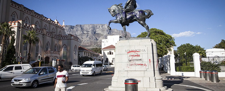 The Louis Botha statue outside of Parliament was defaced with red and purple paint in the early hours of 9 April. Picture: Thomas Holder/EWN