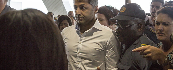 Shrien Dewani arrives at Cape Town International Airport on 9 December 2014. Picture: Thomas Holder/EWN.