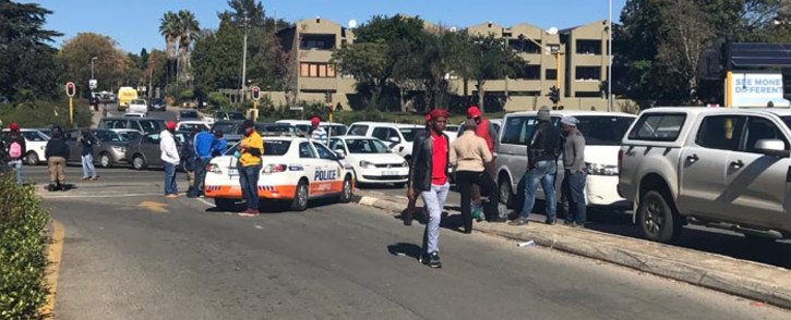 JMPD monitoring Grayston Drive amid protests in the Sandton CDB. Picture: Kgothatso Mogale/EWN.
