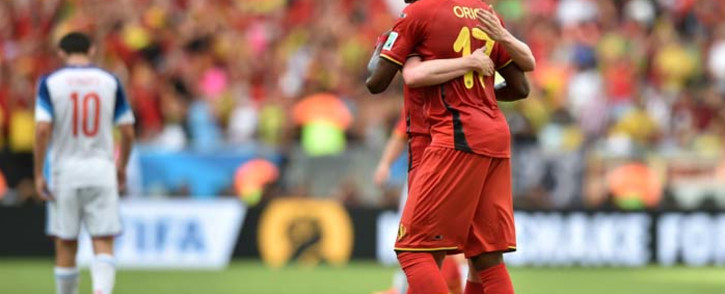 Belgian forward Divock Origi celebrates with midfielder Kevin De Bruyne during the 2014 Fifa World Cup. Picture: AFP. 