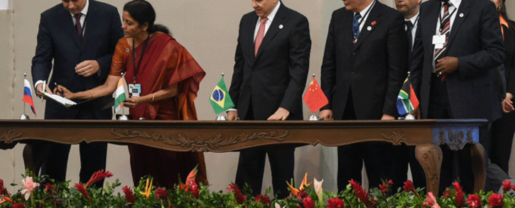 FILE: Delegates of the countries members of the BRICS (Brazil, Russia, India, China and South Africa) sign the creation of their new development bank during the 6th BRICS Summit in Fortaleza, Brazil, on 15 July 2014. Picture: AFP.