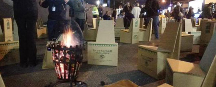 CEOs will sit around these fires and use their cardboards chairs as beds for the 702 Sun International CEO sleepout in Sandton on 18 June 2015. Picture:  Kgothatso Mogale/EWN.