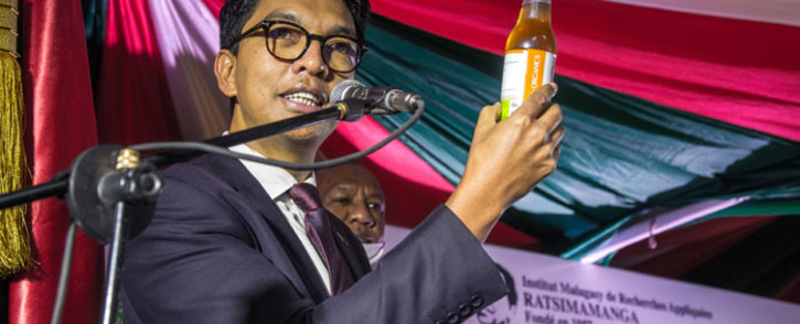 The president of Madagascar Andry Rajoelina attends a ceremony to launch 'Covid Organics' or CVO, in Antananarivo on 20 April 2020. CVO is a remedy from the Malagasy Institute of Applied Research (IMRA) created from the Artemisia plant and is supposed to prevent any infection by COVID-19. Picture: AFP