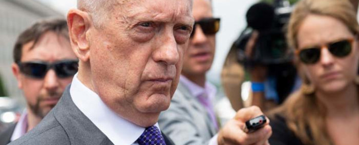 FILE: Jim Mattis speaks to the press outside of the Pentagon in Washington, DC, on 7 August 2018. Picture: AFP.