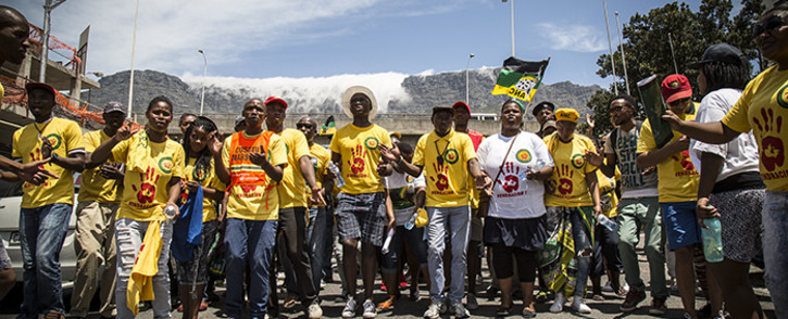 FILE: ANC members dance and sing down Buitenkant Street in Cape Town after holding an anti-racism march outside of the DA headquarters: Thomas Holder/EWN.