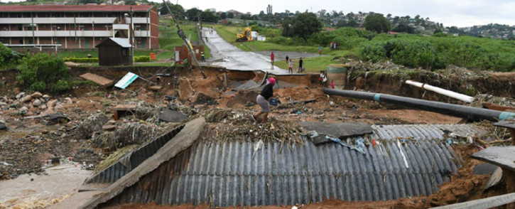 KwaZulu-Natal residents deal with the aftermath of the damage caused by heavy rain and floods on 13 April 2022. Picture: @kzngov/Twitter
