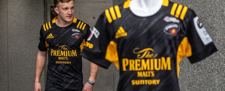 New Zealand rugby player Damian McKenzie attends a photocall after a press conference to mark joining Suntory Sungoliath at Ajinomoto Stadium in the Chofu area of Tokyo on December 21, 2021. Picture: Philip Fong / AFP