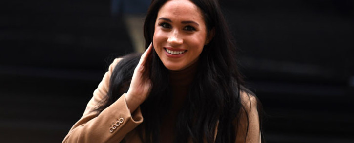 In this file photo taken on 7 January 2020 Britain's Meghan, Duchess of Sussex reacts as she arrives to visit Canada House, in London, in thanks for the warm Canadian hospitality and support they received during their recent stay in Canada. Picture: AFP