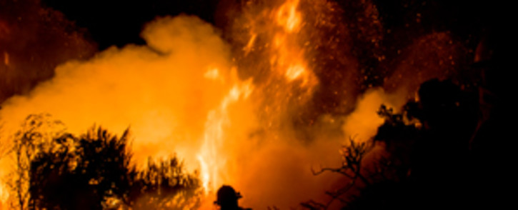 FILE: A firefighter battles a blaze. Picture: Thomas Holder/EWN