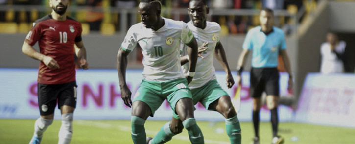 Senegal's Sadio Mane (C) controls the ball during the World Cup 2022 qualifying football match between Senegal and Egypt at the Me Abdoulaye Wade Stadium in Diamniadio on 29 March 2022. Picture: SEYLLOU/AFP