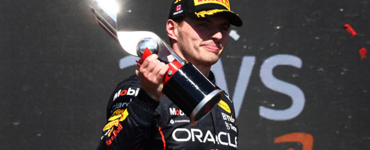 Race winner Max Verstappen of the Netherlands and Oracle Red Bull Racing celebrates on the podium during the F1 Grand Prix of Canada at Circuit Gilles Villeneuve on 19 June 2022 in Montreal, Quebec. Picture: Clive Rose/Getty Images/AFP