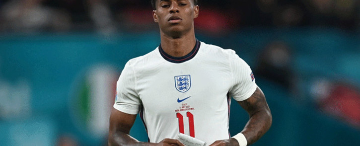England's forward Marcus Rashford carries a note during the UEFA EURO 2020 final football match between Italy and England at the Wembley Stadium in London on July 11, 2021. Picture: Paul Ellis / POOL / AFP