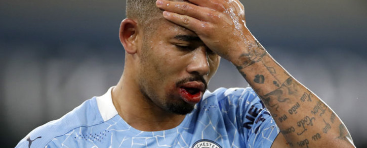 Manchester City striker Gabriel Jesus holds his head after a challenge during the English Premier League football match between Manchester City and West Bromwich Albion at the Etihad Stadium in Manchester, north west England, on 15 December 2020. Picture: AFP