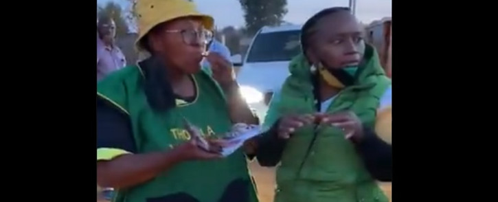 In the clip, the women can be heard mockingly speaking of the local economy while eating the chicken feet as a little boy watches on. Picture: Twitter screengrab.