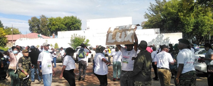 Operation Dudula members gathered outside the Roodepoort Magistrates Court on 25 March 2022 ahead of Nhlanhla Lux's appearance. Picture: Mihlali Ntsabo/EWN.