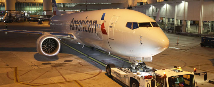 A grounded American Airlines Boeing 737 Max 8 is towed to another location at Miami International Airport on 13 March 2019 in Miami, Florida. Picture: AFP