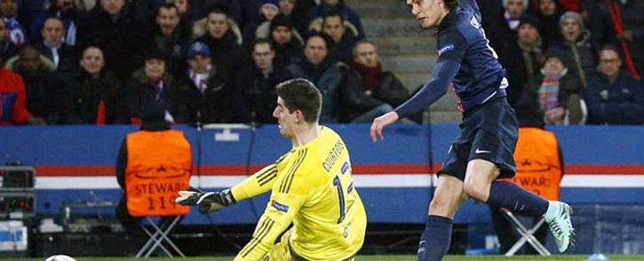 PSG's Edinson Cavani slots the ball passed Chelsea FC goalkeeper Thibaut Courtois for a goal during the Uefa Champions League match on 17 February 2016. Picture: PSG/Facebook.