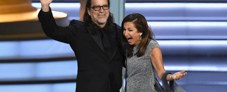 Glenn Weiss (L), winner of the Outstanding Directing for a Variety Special award for 'The Oscars,' and Jan Svendsen react after getting engaged on stage during the 70th Emmy Awards at Microsoft Theater on 17 September 2018 in Los Angeles, California. Picture: Getty Images/AFP