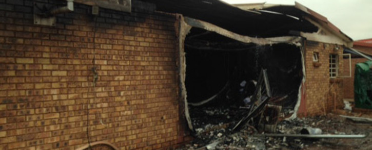 Angry residents in Guguglethu informal settlement torched and damaged the offices of the Community Policing Forum in the East Rand. Picture: Vumani Mkhize/EWN.