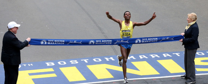Lelisa Desisa of Ethiopa crosses the finish line to win the 119th Boston Marathon on 20 April, 2015 in Boston, Massachusetts. Picture: AFP.