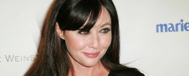 Actress Shannen Doherty arrives at The Weinstein Company And Relativity Medias 2011 Golden Globe Awards Party held at The Beverly Hilton hotel on 16 January, 2011 in Beverly Hills, California. Picture: AFP.