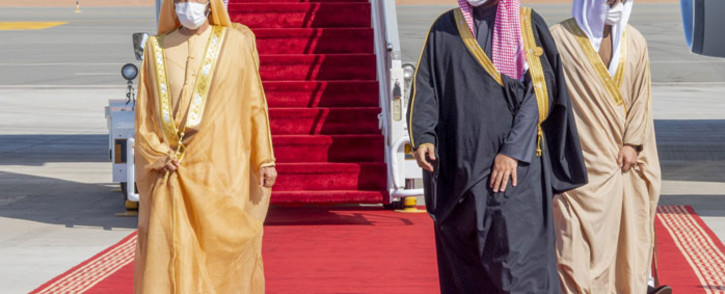 A handout picture provided by the Saudi Royal Palace on 5 January 2021, shows Crown Prince Mohammed bin Salman (R) welcoming Dubai's ruler and UAE Vice President Sheikh Mohammed bin Rashid Al-Maktoum upon his arrival in the city of al-Ula in northwestern Saudi Arabia for the 41st Gulf Cooperation Council summit. Picture: AFP