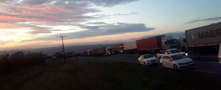 Trucks are seen parked on the N3 at Van Reenen's between Durban and Johannesburg during a protest on 3 December 2021. Picture: @SAPoliceService/Twitter