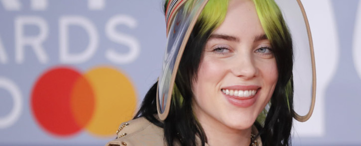 US singer-songwriter Billie Eilish poses on the red carpet on arrival for the BRIT Awards 2020 in London on 18 February 2020. Picture: AFP