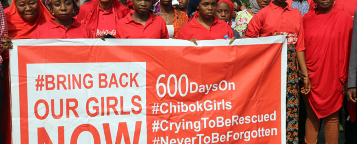 FILE: Members of the ‘Bring Back Our Girls’ movement march to press for the release of the missing schoolgirls kidnapped in 2014 from their school in Chibok by Islamist group Boko Haram, during a rally in Abuja in January 2016. Picture: AFP.