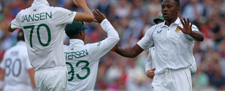 South Africa's Kagiso Rabada (R) celebrates with teammates after taking the wicket of England's Zak Crawley during play on the opening day of the first Test match between England and South Africa at the Lord's cricket ground in London on 17 August 2022. Picture: Adrian DENNIS/AFP