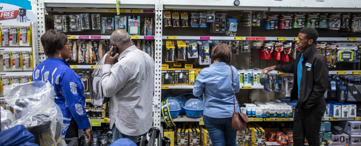 Customers visit the camping section at Makro Woodmead to purchase camping lighting to tackle the darkness of load shedding. Picture: Thomas Holder/EWN