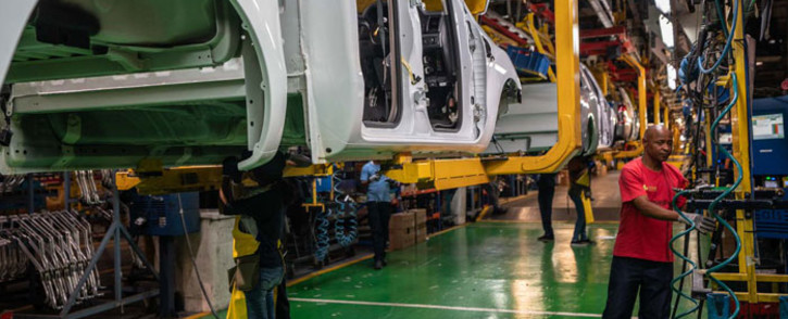 Workers assemble a vehicle at Ford's Silverton assembly plant. Picture: @FordSouthAfrica/Twitter