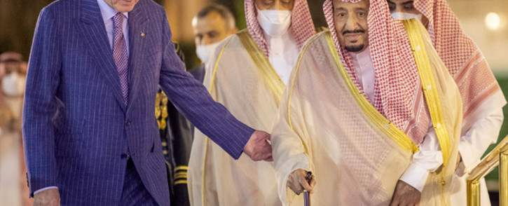 This handout image released by the Saudi press Agency (SPA) on 28 April 2022 shows Saudi King Salman bin Abdulaziz escorting Turkish President Tayyip Erdogan (L) during a meeting in Saudi Arabia's Red Sea coastal city of Jeddah. Picture: SPA/AFP
