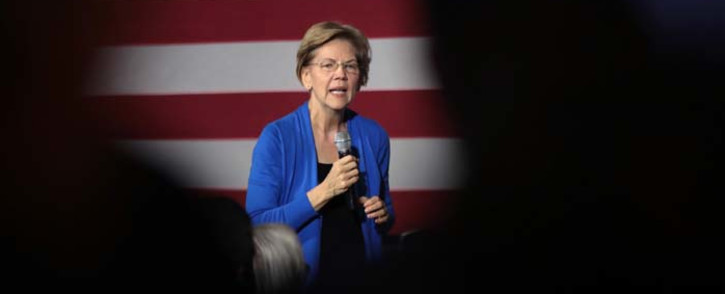 FILE: Democratic presidential candidate Senator Elizabeth Warren speaks to guests during a campaign stop at the CSPS cultural center on 21 December 2019, in Cedar Rapids, Iowa. Picture: AFP