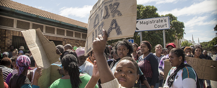 Masiphumelele residents gathered outside Simons Town Magistrates Court in support of community activist Lubabalo Vellem, who has been accused of murder after he allegedly assaulted a man in his community who later died of his injuries. Picture: Thomas Holder/EWN