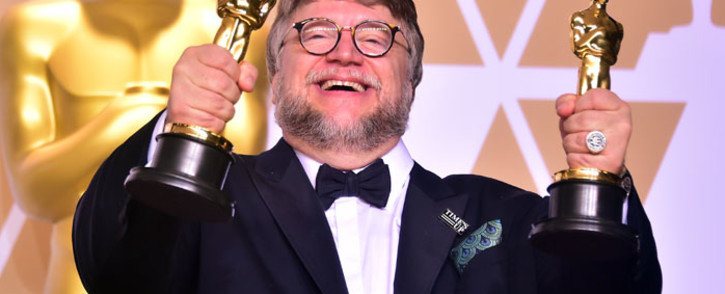 'The Shape of Water' director Guillermo del Toro with his Oscar awards on 4 March 2018. Picture: AFP