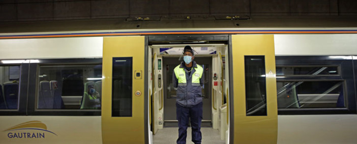 FILE: A Gautrain security official is seen standing at the door of the train at the Hatfield Station in Pretoria. Picture: AFP
